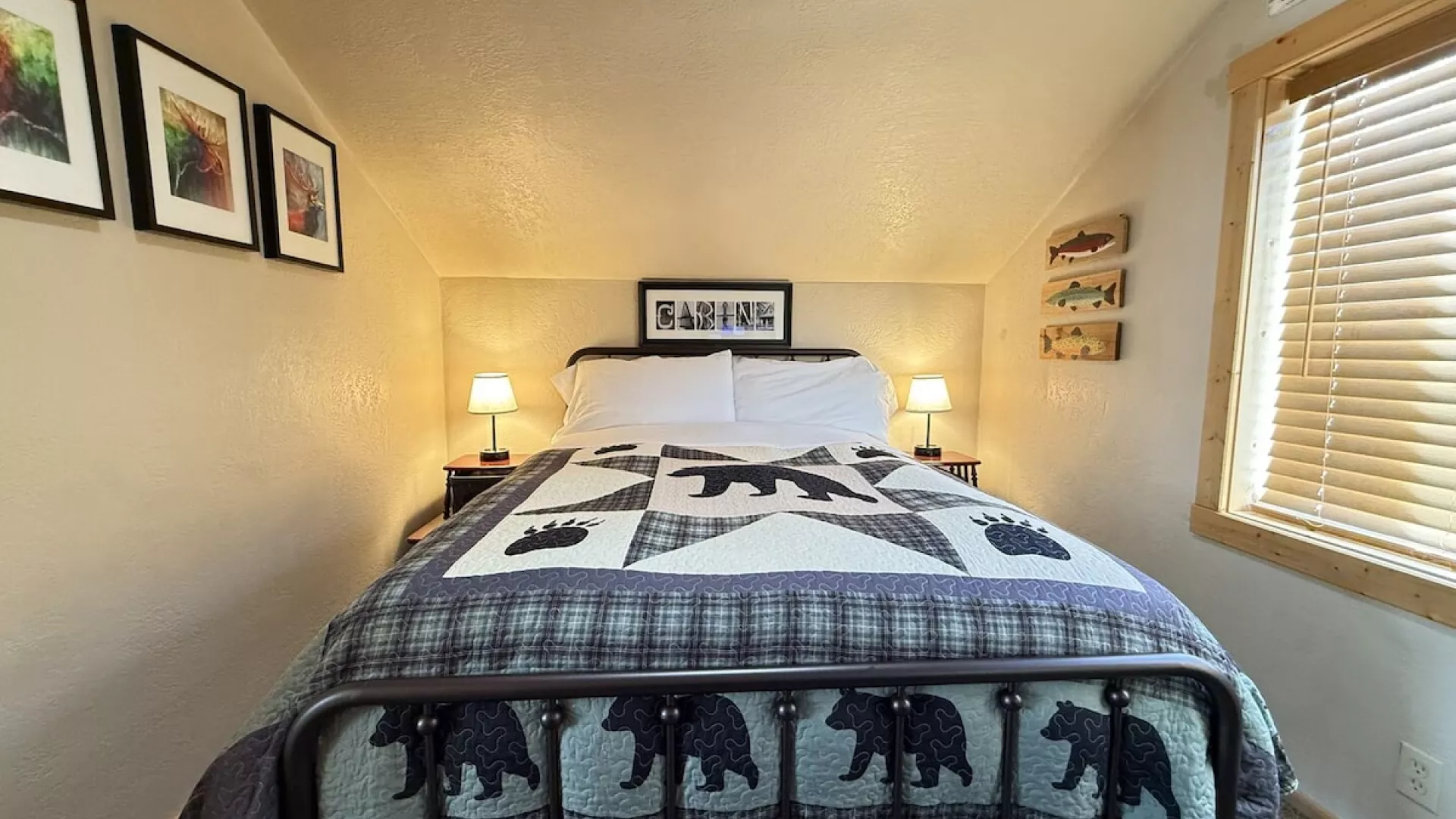 Upstairs bedroom with a queen bed.