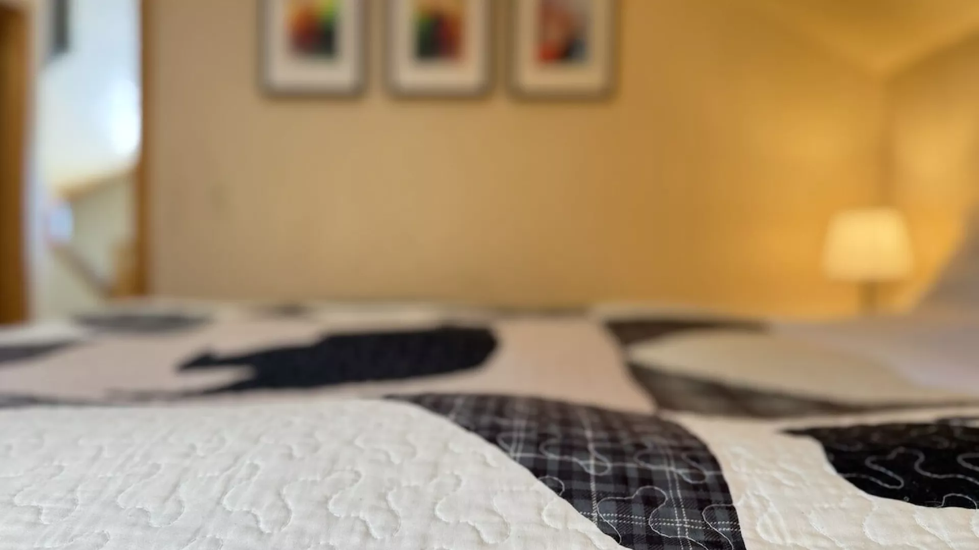 This bedroom feels like a serene sanctuary, offering a peaceful escape surrounded by nature.