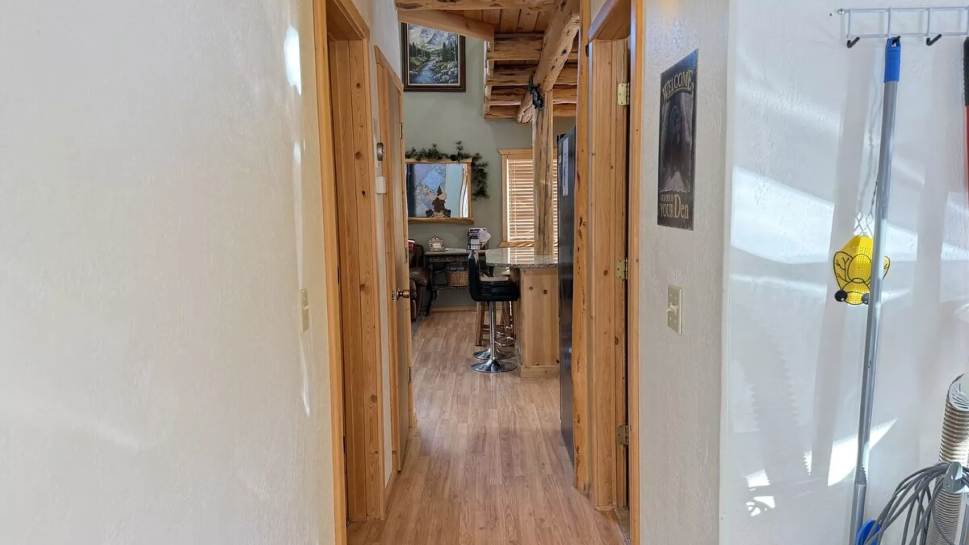 The hallway that leads you from the back door to the main area of the cabin.
