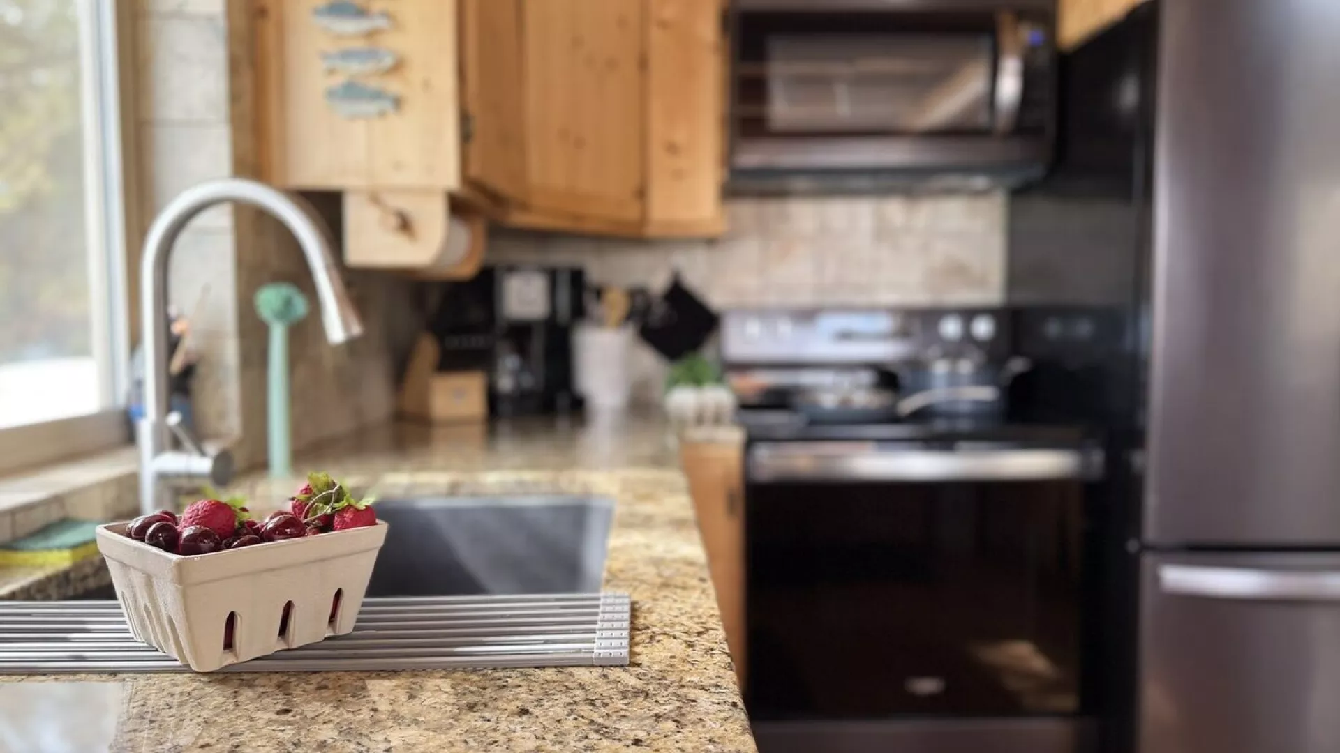 The kitchen in this cabin exudes warmth and practicality, designed for both comfort and functionality.