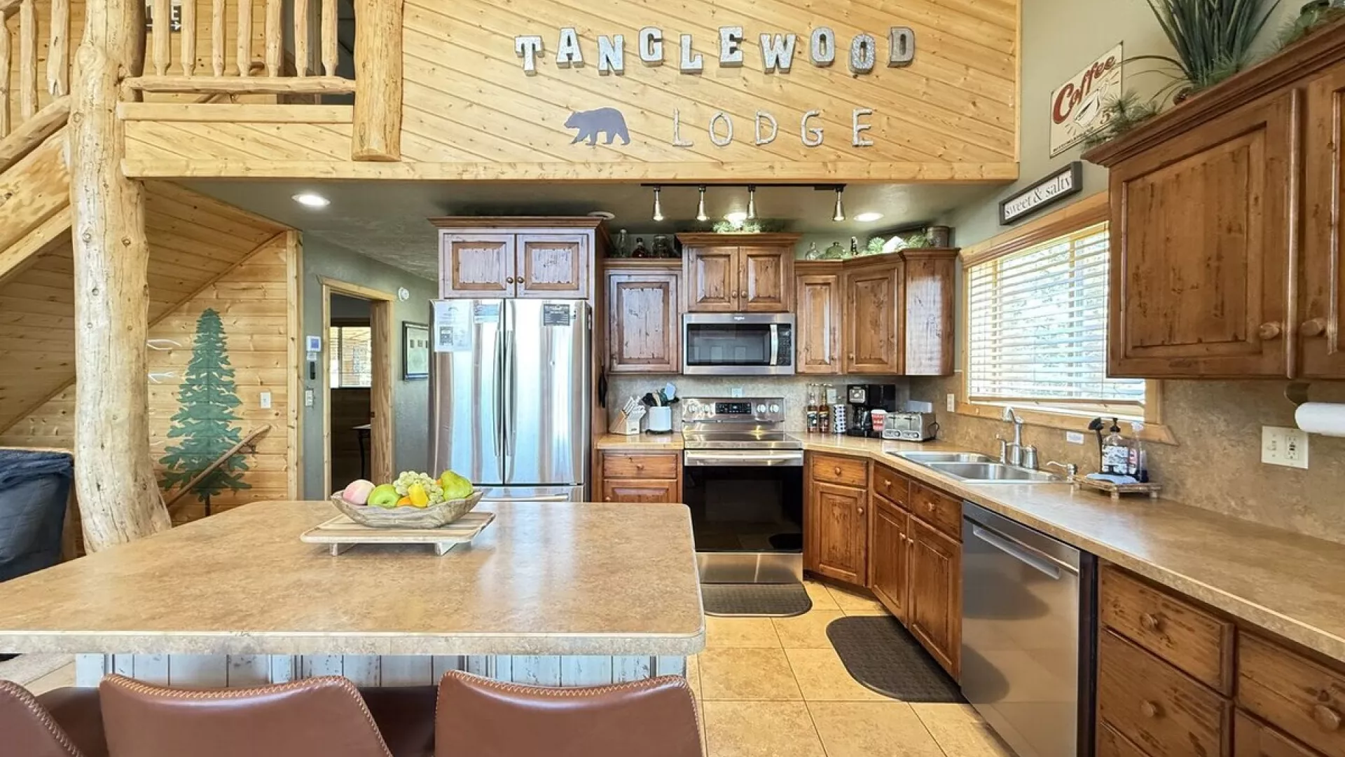 Full kitchen with appliances, cookware, dishes, silverware, and basic spices.