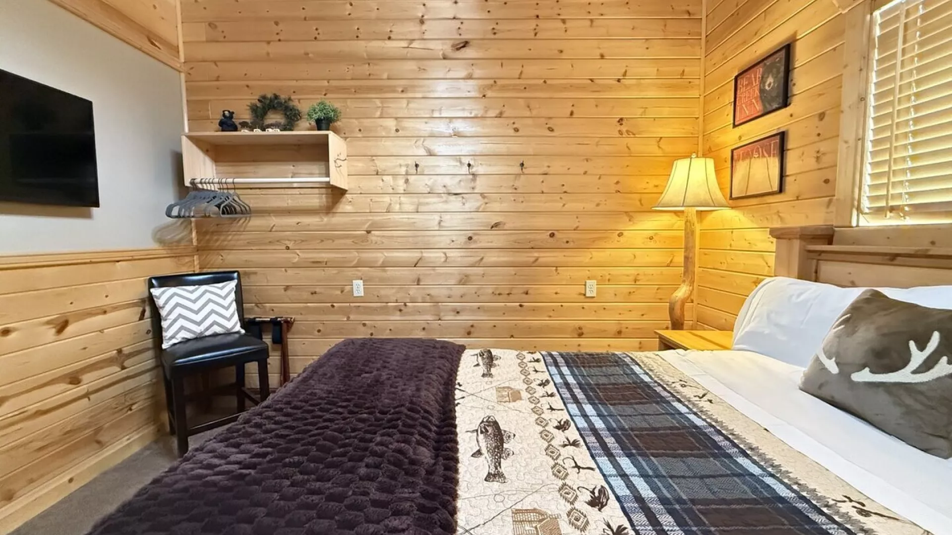 Imagine a cozy cabin bedroom that instantly makes you want to curl up and stay awhile.
