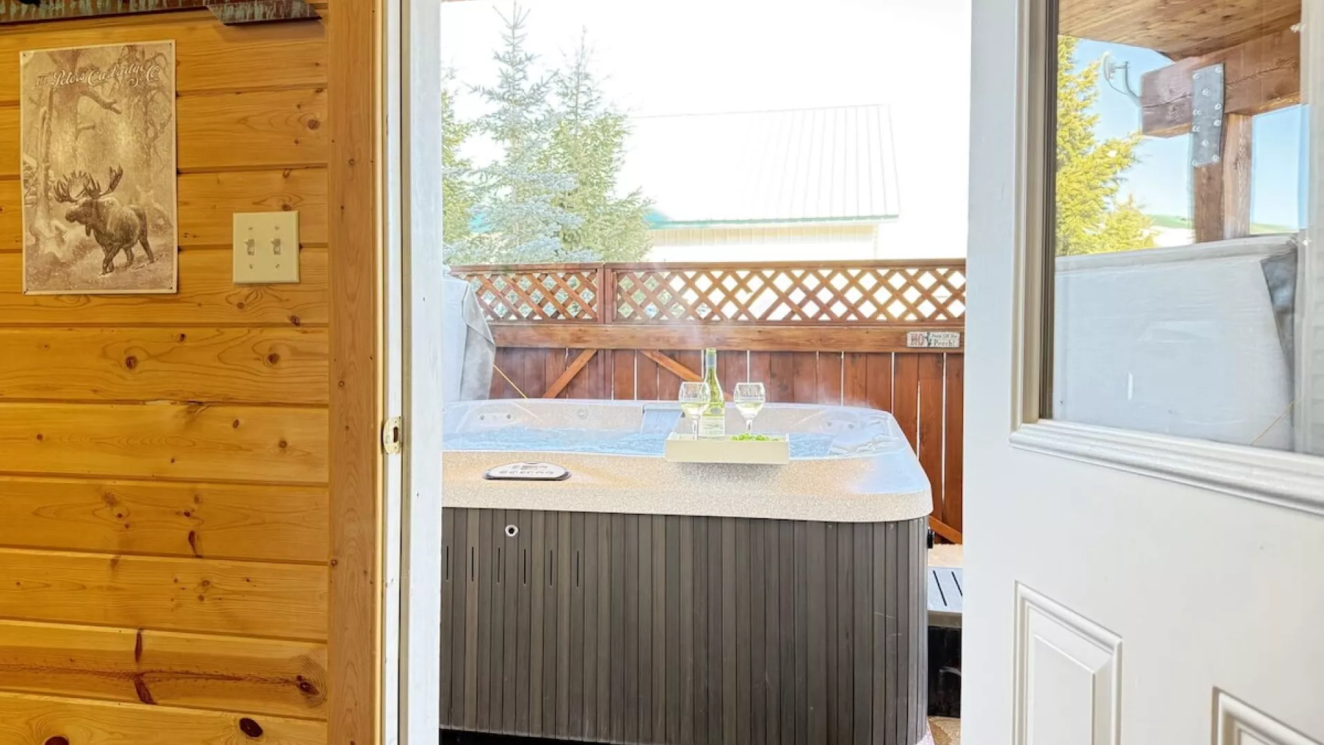 Walk out back to enjoy the hot tub available year round.