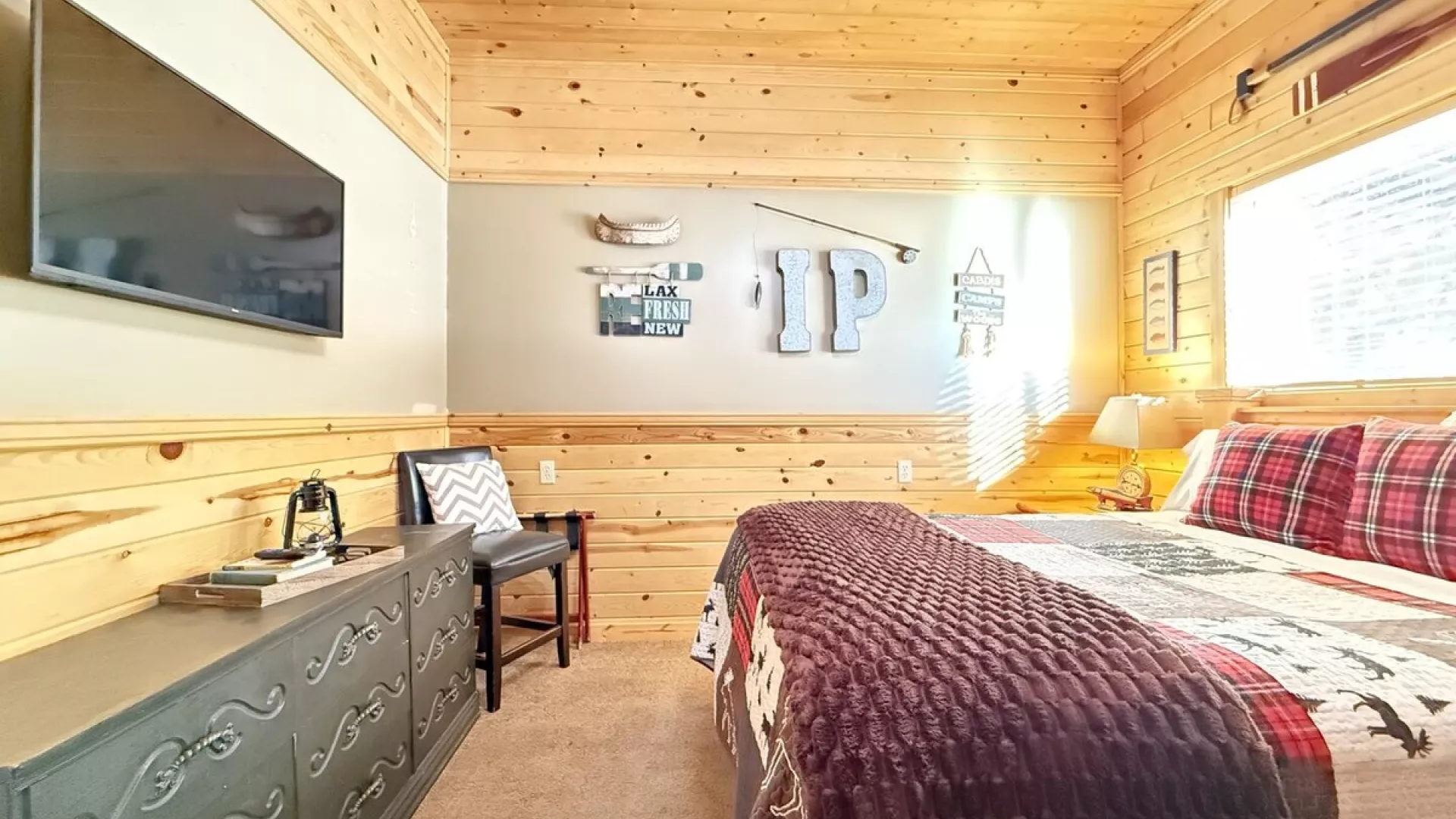 Imagine a cozy cabin bedroom that instantly makes you want to curl up and stay awhile.