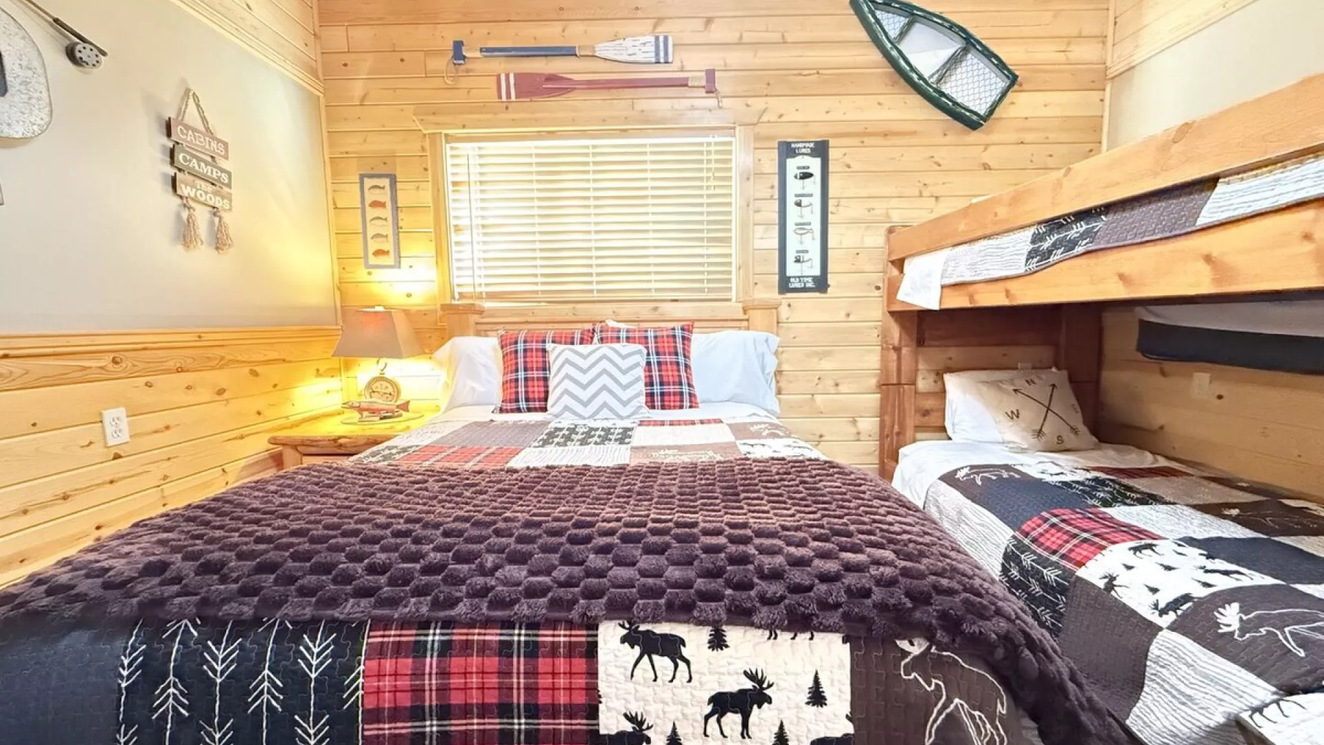 Welcome to the third bedroom with a queen bed and 2 twin beds on a bunk bed.