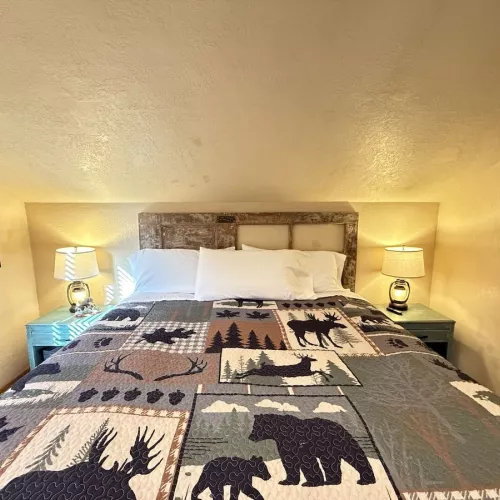 Upstairs bedroom with queen bed to comfortably sleep 2 people.