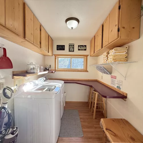 Downstairs a laundry room with a washer and dryer is located for you to use. Laundry soap is provided.