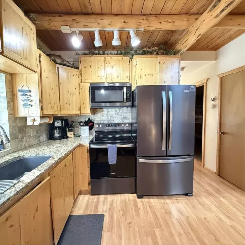 The kitchen lets in lots of natural light.