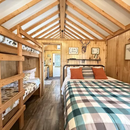 Along with the queen are two small bunkbeds for your little ones.