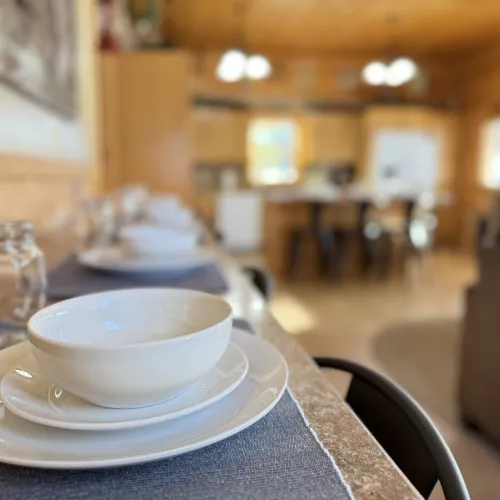Have a nice cozy meal in the cabin with enough seating for everyone.