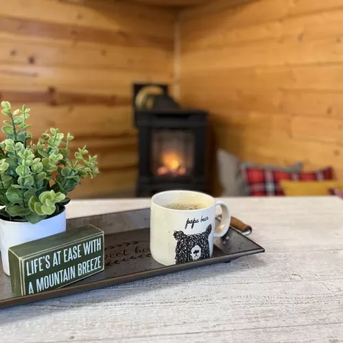 Enjoy a cup of coffee by the fire.