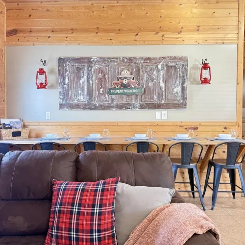 Just behind the main seating area, there’s a functional and stylish island that blends the kitchen and living space effortlessly.